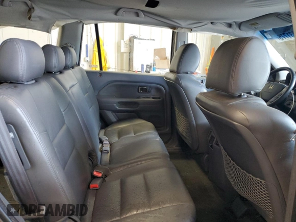 2007 Honda Pilot LX z VIN 5FNYF28107B025518, wystawiony jako Copart lot #58331775 z przebiegiem 130 641 mil mil oraz Nie do naprawy • Non repairable. Historia ofert i sprzedaży dostępna na DreamBid. Obrazek 11.