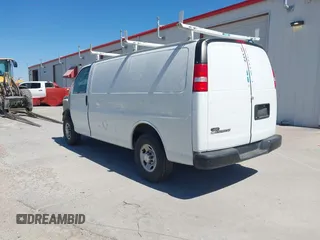 2018 Chevrolet Express Cargo Van with VIN 1GCWGAFP6J1332570, listed as a IAAI auction lot 41482103 with 142,405 mi miles. Bid and sale history available at carsss.com. Image 3.