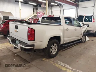 2019 Chevrolet Colorado 2WD Work Truck with VIN 1GCGSBEN6K1349332, listed as a IAAI auction lot 41900272 with 68,657 mi miles and . Bid and sale history available at DreamBid. Image 4.