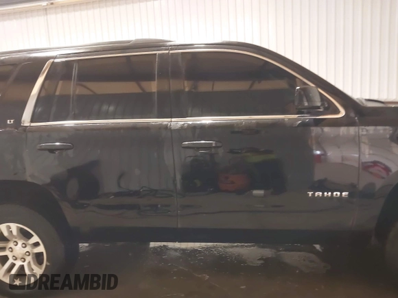 2017 Chevrolet Tahoe LT with VIN 1GNSKBKC6HR299126, listed as a IAAI auction lot 41300644 with 124,821 mi miles and . Bid and sale history available at DreamBid. Image 13.