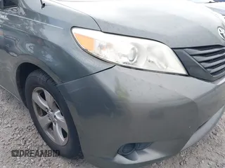 2014 Toyota Sienna L with VIN 5TDZK3DC6ES421278, listed as a IAAI auction lot 41178679 with 202,823 mi miles. Bid and sale history available at carsss.com. Image 20.
