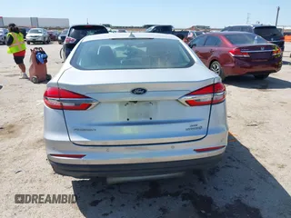 2019 Ford Fusion SE with VIN 3FA6P0LU1KR222141, listed as a IAAI auction lot 42000677 with 122,898 mi miles and . Bid and sale history available at carsss.com. Image 16.