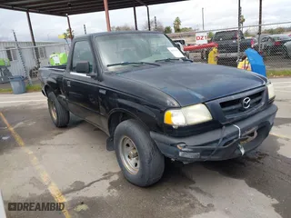 2003 Mazda B-Series 2WD Truck SX with VIN 4F4YR12D23TM09609, listed as a IAAI auction lot 41571323 with 194,860 mi miles. Bid and sale history available at carsss.com. Image 1.