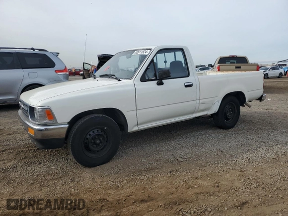 1993 Toyota Pickup DX with VIN JT4RN81P4P5168613, listed as a Copart auction lot 82611524 with 200,408 mi miles and Clean title. Bid and sale history available at DreamBid. Image 1.