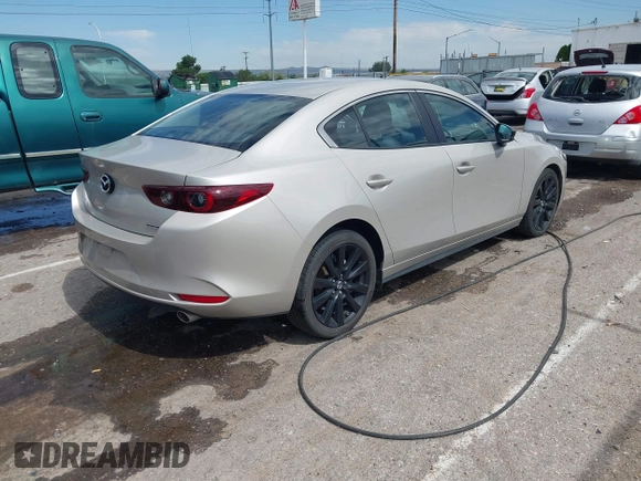 2024 Mazda 3 S Select Sport with VIN 3MZBPABMXRM427929, listed as a IAAI auction lot 42593321 with 20,378 mi miles and . Bid and sale history available at DreamBid. Image 4.