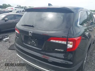 2021 Honda Pilot EX-L with VIN 5FNYF6H53MB097089, listed as a IAAI auction lot 42309359 with 58,371 mi miles and . Bid and sale history available at DreamBid. Image 17.