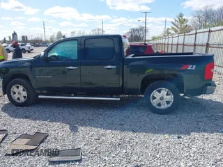 2013 Chevrolet Silverado 1500 LT with VIN 3GCPKSE77DG256115, listed as a IAAI auction lot 41984990 with 270,324 mi miles. Bid and sale history available at carsss.com. Image 14.