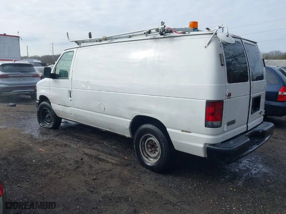 2011 Ford Econoline Cargo Van Commercial with VIN 1FTNE2EL6BDA76582, listed as a IAAI auction lot 41088478 with 105,002 mi miles. Bid and sale history available at carsss.com. Image 3.
