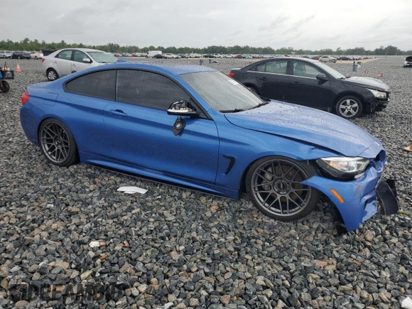 2014 BMW 4 Series 435i xDrive with VIN WBA3R5C50EK187272, listed as a Copart auction lot 56579855 with 129,873 mi miles and Salvage title. Bid and sale history available at DreamBid. Image 4.