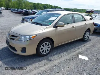 2011 Toyota Corolla L with VIN 2T1BU4EEXBC574462, listed as a IAAI auction lot 42201077 with 222,929 mi miles and . Bid and sale history available at DreamBid. Image 2.