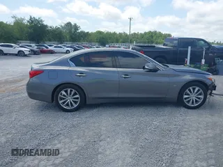 2015 Infiniti Q50 with VIN JN1BV7AP4FM338889, listed as a IAAI auction lot 42285135 with 150,867 mi miles and . Bid and sale history available at DreamBid. Image 14.