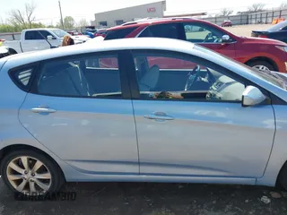 2012 Hyundai Accent SE with VIN KMHCU5AE0CU022050, listed as a IAAI auction lot 41955452 with 140,460 mi miles. Bid and sale history available at carsss.com. Image 13.