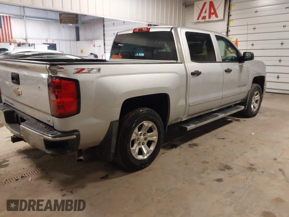 2014 Chevrolet Silverado 1500 LT with VIN 3GCUKREC4EG291351, listed as a IAAI auction lot 41732290 with 194,135 mi miles and . Bid and sale history available at DreamBid. Image 4.