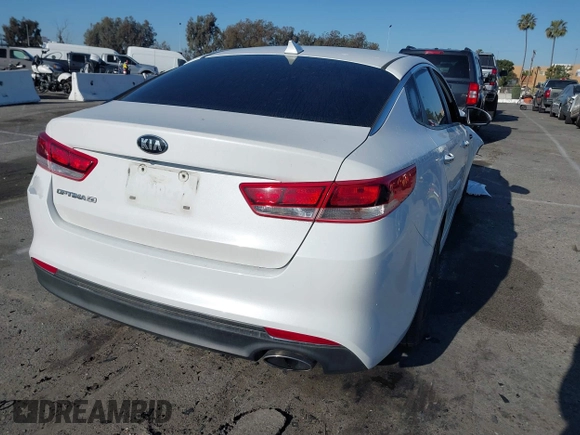 2016 Kia Optima LX with VIN 5XXGT4L33GG014082, listed as a IAAI auction lot 41870030 with 137,849 mi miles and . Bid and sale history available at DreamBid. Image 4.