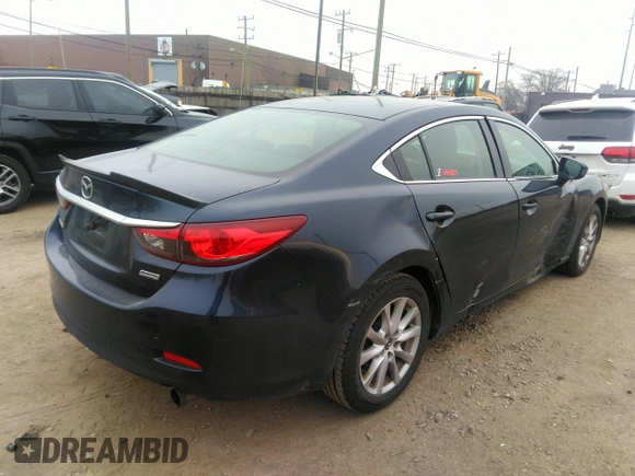 2015 Mazda 6 i Sport with VIN JM1GJ1U51F1185105, listed as a IAAI auction lot 41287570 with 133,016 mi miles and . Bid and sale history available at carsss.com. Image 4.