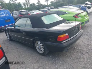 1999 BMW 3 Series 323i with VIN WBABJ8330XEM23911, listed as a IAAI auction lot 42523948 with 125,371 mi miles and . Bid and sale history available at DreamBid. Image 3.