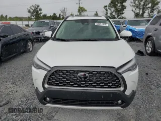 2023 Toyota Corolla Cross XLE с VIN 7MUDAAAG6PV071281, выставлен на аукционе Copart как лот 59691915 с пробегом Не указан миль и Списание • Salvage title. История ставок и продаж доступна на DreamBid. Изображение 5.