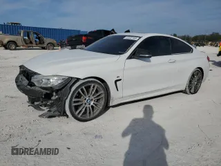 2016 BMW 4 Series 428i with VIN WBA3N7C56GK226974, listed as a Copart auction lot 43332165 with 102,901 mi miles and Salvage Title. Bid and sale history available at carsss.com. Image 1.