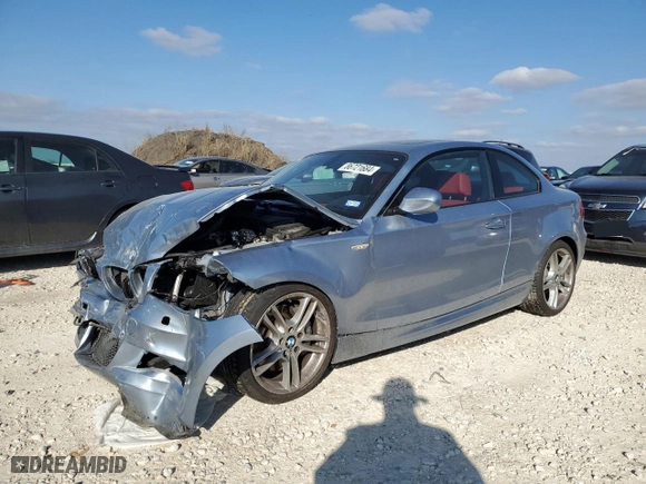 2011 BMW 1 Series 135i with VIN WBAUC9C59BVM11260, listed as a Copart auction lot 86721684 with 56,914 mi miles and Salvage Title. Bid and sale history available at carsss.com. Image 1.