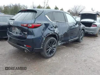 2022 Mazda CX-5 2.5 Turbo with VIN JM3KFBAY8N0635618, listed as a IAAI auction lot 41199038 with Not Provided miles and . Bid and sale history available at carsss.com. Image 4.