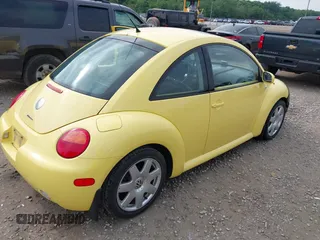 2003 Volkswagen Beetle GLX z VIN 3VWDD21C83M428634, wystawiony jako IAAI lot #42418633 z przebiegiem 188 472 mil mil oraz . Historia ofert i sprzedaży dostępna na DreamBid. Obrazek 4.