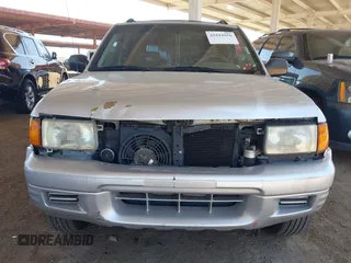 1999 Isuzu Rodeo S with VIN 4S2CM58W9X4354789, listed as a IAAI auction lot 42444956 with Not provided miles and . Bid and sale history available at DreamBid. Image 6.
