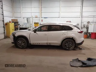 2016 Mazda CX-9 Touring with VIN JM3TCBCY3G0114707, listed as a IAAI auction lot 42023034 with 225,281 mi miles and . Bid and sale history available at DreamBid. Image 14.