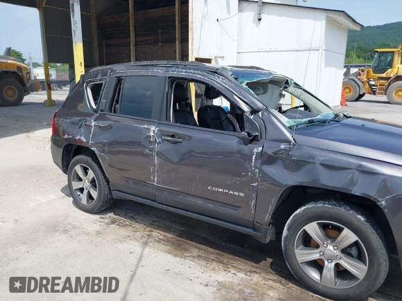 2016 Jeep Compass High Altitude Edition with VIN 1C4NJDEB0GD558230, listed as a IAAI auction lot 39799941 with 57,002 mi miles. Bid and sale history available at carsss.com. Image 16.