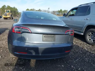 2023 Tesla Model 3 with VIN 5YJ3E1EAXPF666252, listed as a IAAI auction lot 42009929 with 27,328 mi miles and . Bid and sale history available at DreamBid. Image 17.