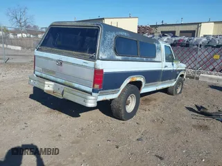 1986 Ford F-150 with VIN 1FTEF14N0GPA37633, listed as a IAAI auction lot 42084341 with 230,894 mi miles. Bid and sale history available at carsss.com. Image 4.