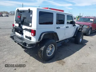 2014 Jeep Wrangler Unlimited Sahara with VIN 1C4BJWEG6EL203866, listed as a IAAI auction lot 41846091 with 105,296 mi miles. Bid and sale history available at carsss.com. Image 4.