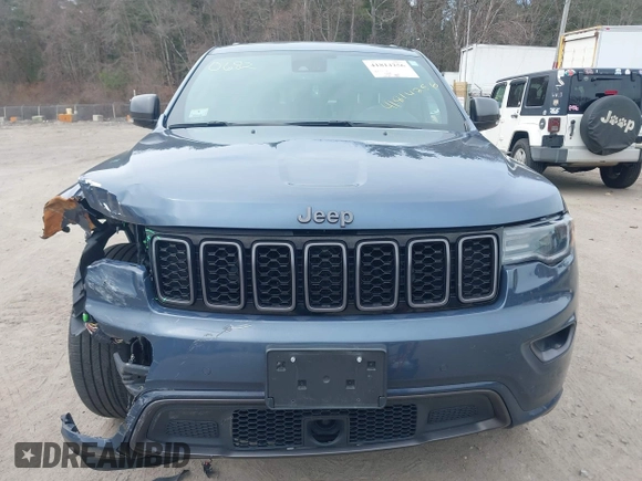 2021 Jeep Grand Cherokee Limited z VIN 1C4RJFBG1MC565928, wystawiony jako IAAI lot #41814256 z przebiegiem 70 324 mil mil oraz . Historia ofert i sprzedaży dostępna na DreamBid. Obrazek 12.