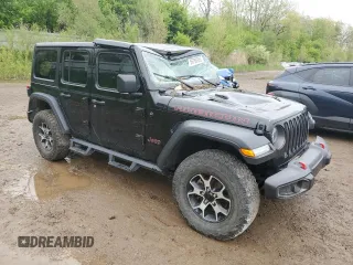 2021 Jeep Wrangler Unlimited Rubicon with VIN 1C4HJXFNXMW612186, listed as a Copart auction lot 56786665 with 52,379 mi miles and Salvage title. Bid and sale history available at DreamBid. Image 4.