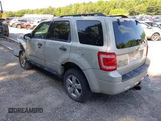 2008 Ford Escape XLT with VIN 1FMCU93198KE17879, listed as a IAAI auction lot 40125825 with 214,373 mi miles and . Bid and sale history available at DreamBid. Image 3.