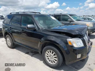 2011 Mercury Mariner Premier with VIN 4M2CN8HGXBKJ07489, listed as a IAAI auction lot 42574942 with 163,786 mi miles and . Bid and sale history available at DreamBid. Image 1.