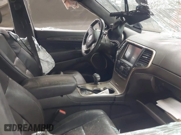 2014 Jeep Grand Cherokee Summit with VIN 1C4RJFJT6EC346575, listed as a IAAI auction lot 41881795 with 148,941 mi miles and . Bid and sale history available at DreamBid. Image 5.