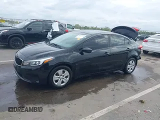 2017 Kia Forte LX with VIN 3KPFK4A70HE099395, listed as a IAAI auction lot 40433686 with 120,337 mi miles. Bid and sale history available at carsss.com. Image 2.