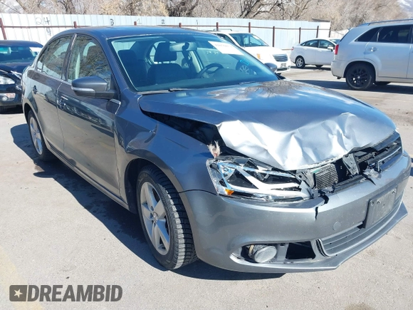 2012 Volkswagen Jetta TDI w/Premium & Nav z VIN 3VWLL7AJ5CM361646, wystawiony jako IAAI lot #41856672 z przebiegiem 190 292 mil mil oraz . Historia ofert i sprzedaży dostępna na DreamBid. Obrazek 1.