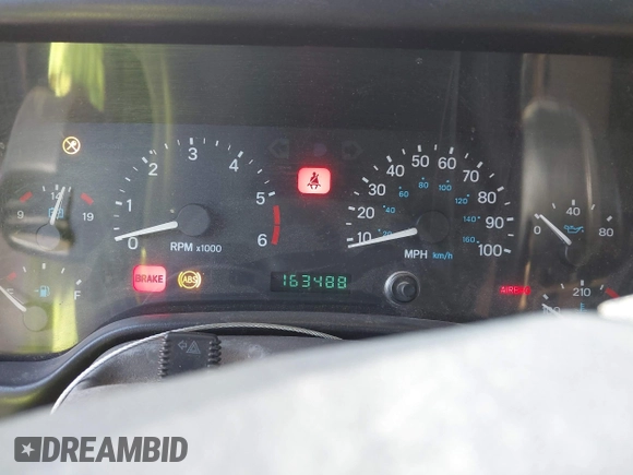 2000 Jeep Wrangler Sahara with VIN 1J4FA59S7YP805628, listed as a IAAI auction lot 42259201 with Not provided miles and . Bid and sale history available at DreamBid. Image 7.