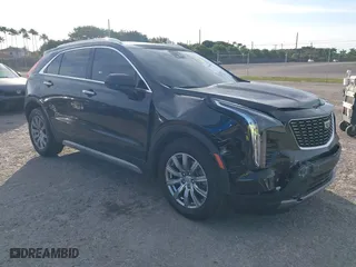 2020 Cadillac XT4 FWD Premium Luxury with VIN 1GYFZCR44LF070832, listed as a IAAI auction lot 41249608 with 77,471 mi miles. Bid and sale history available at carsss.com. Image 1.