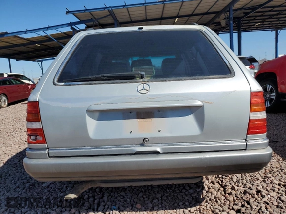 1994 Mercedes-Benz E with VIN WDBEA92E2RF283381, listed as a Copart auction lot 50025645 with 131,140 mi miles and Salvage Title. Bid and sale history available at DreamBid. Image 6.