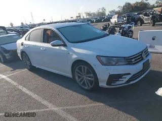 2018 Volkswagen Passat 2.0T S with VIN 1VWAA7A35JC009020, listed as a IAAI auction lot 41955626 with 99,900 mi miles. Bid and sale history available at carsss.com. Image 1.