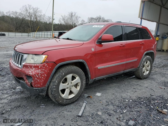 2011 Jeep Grand Cherokee Laredo with VIN 1J4RR4GT1BC542031, listed as a Copart auction lot 42792985 with 221,000 mi miles and Salvage Title. Bid and sale history available at carsss.com. Image 1.