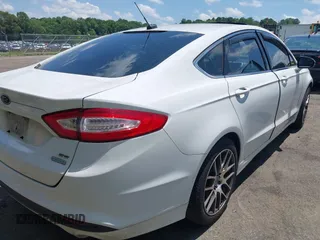 2015 Ford Fusion SE with VIN 3FA6P0HD3FR125456, listed as a IAAI auction lot 42508769 with 143,706 mi miles and . Bid and sale history available at DreamBid. Image 4.