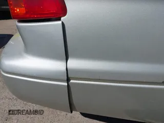 2000 Toyota Camry CE z VIN JT2BG22K6Y0451632, wystawiony jako IAAI lot #42030842 z przebiegiem 200 734 mil mil oraz . Historia ofert i sprzedaży dostępna na DreamBid. Obrazek 14.