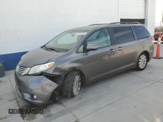 2011 Toyota Sienna XLE z VIN 5TDDK3DC5BS008922, wystawiony jako Copart lot #52812105 z przebiegiem 184 583 mil mil oraz Szkoda całkowita • Salvage title. Historia ofert i sprzedaży dostępna na DreamBid. Obrazek 1.