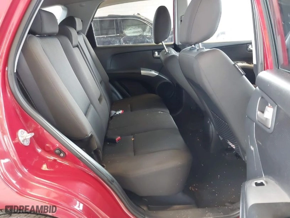 2009 Kia Sportage LX with VIN KNDJE723597600071, listed as a IAAI auction lot 41859059 with 135,760 mi miles. Bid and sale history available at carsss.com. Image 8.