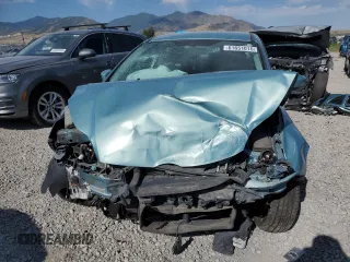 2012 Ford Focus SE with VIN 1FAHP3F24CL163896, listed as a Copart auction lot 61651015 with Not provided miles and Salvage title. Bid and sale history available at DreamBid. Image 5.