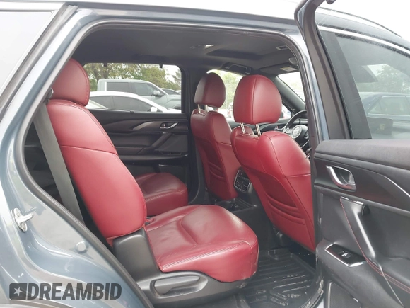 2023 Mazda CX-9 Grand Touring with VIN JM3TCBDY2P0636226, listed as a IAAI auction lot 42384360 with 161,352 mi miles and . Bid and sale history available at DreamBid. Image 8.