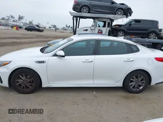 2019 Kia Optima LX with VIN 5XXGT4L35KG324274, listed as a IAAI auction lot 42111177 with 126,494 mi miles. Bid and sale history available at carsss.com. Image 14.